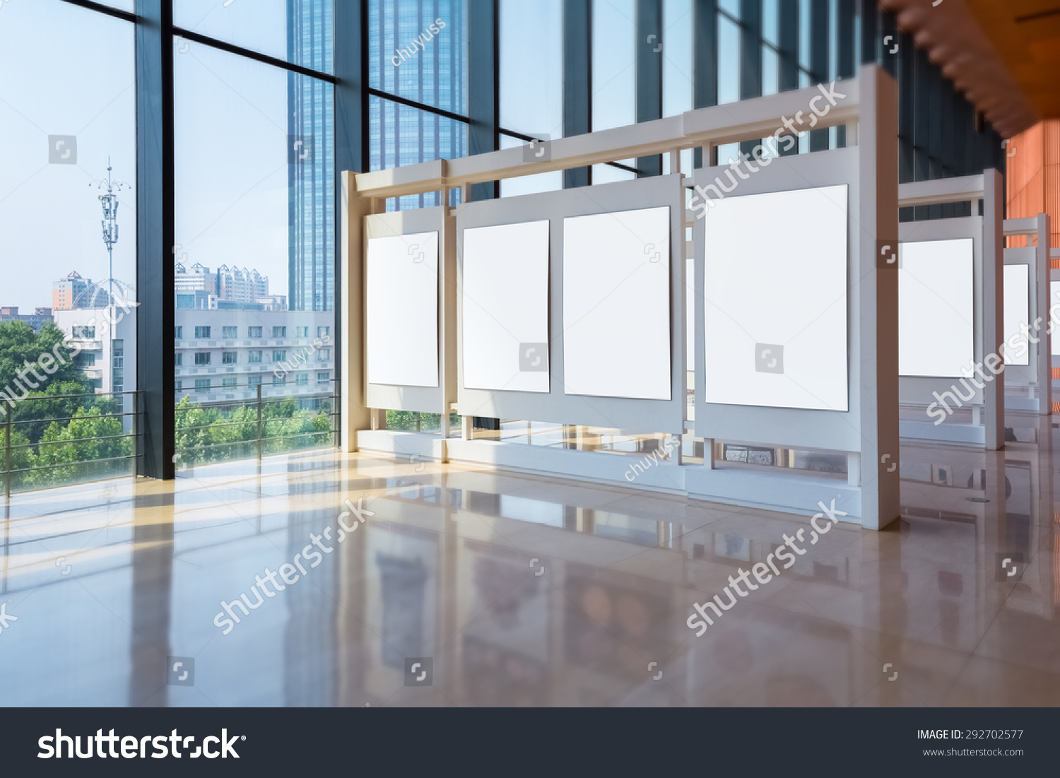 blank panel stands along the modern exhibition hall