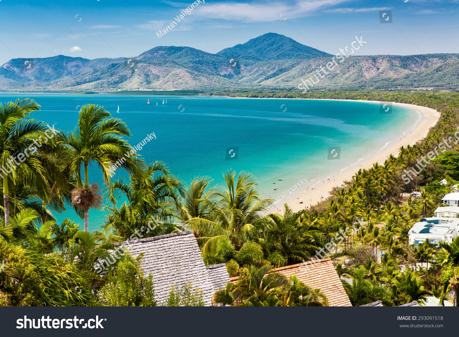 Port Douglas beach and ocean on sunny day  Queensland  Australia