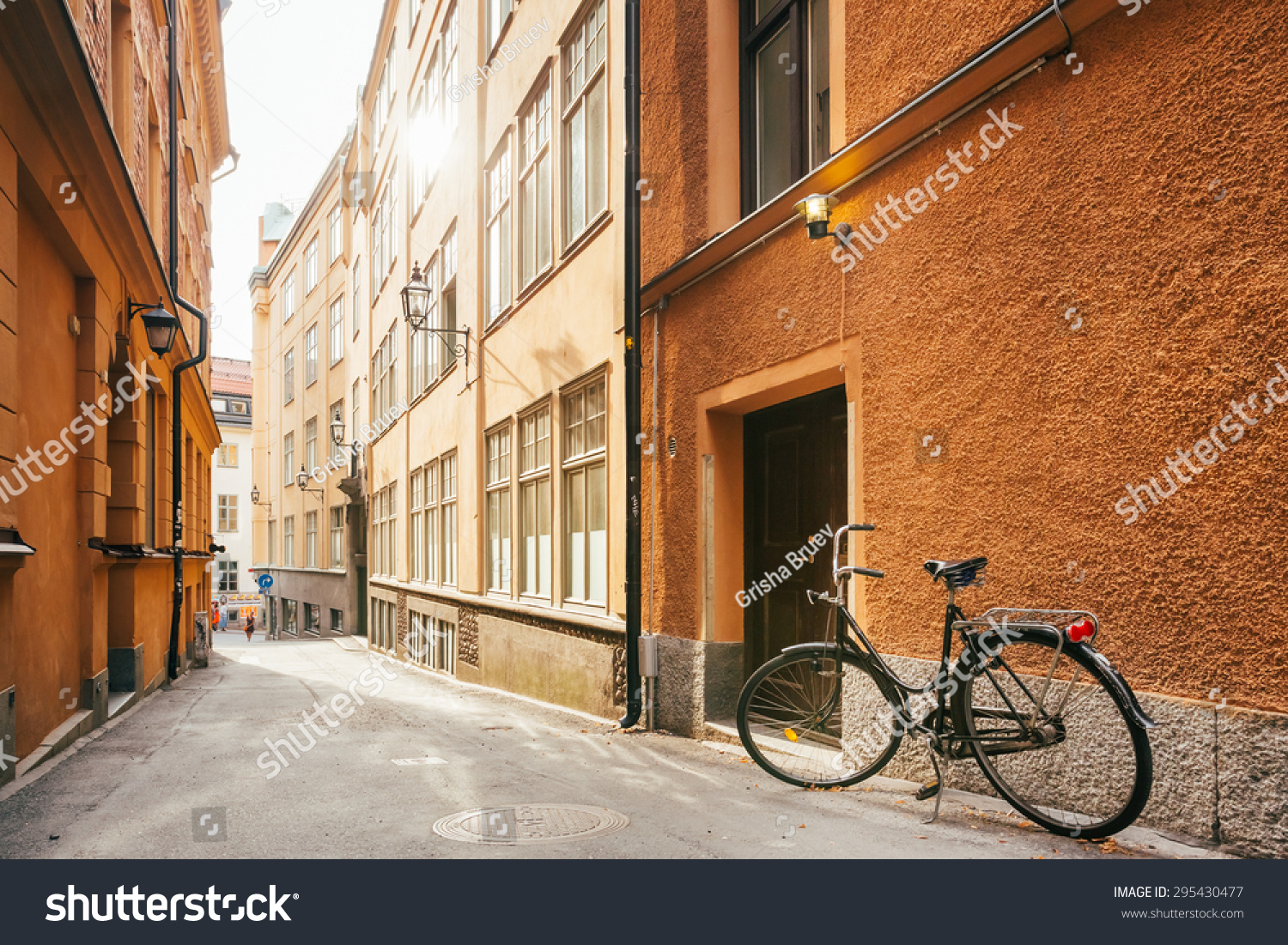 Parked Bicycle On Sidewalk In Old European Town. Bike Parking On Street  Stockholm  Sweden
