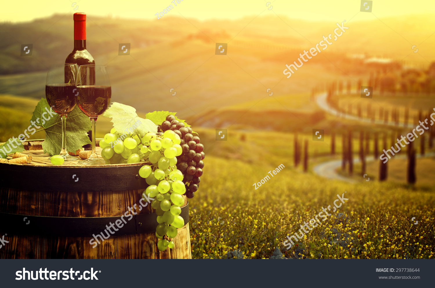 Red wine with barrel on vineyard in green Tuscany  Italy