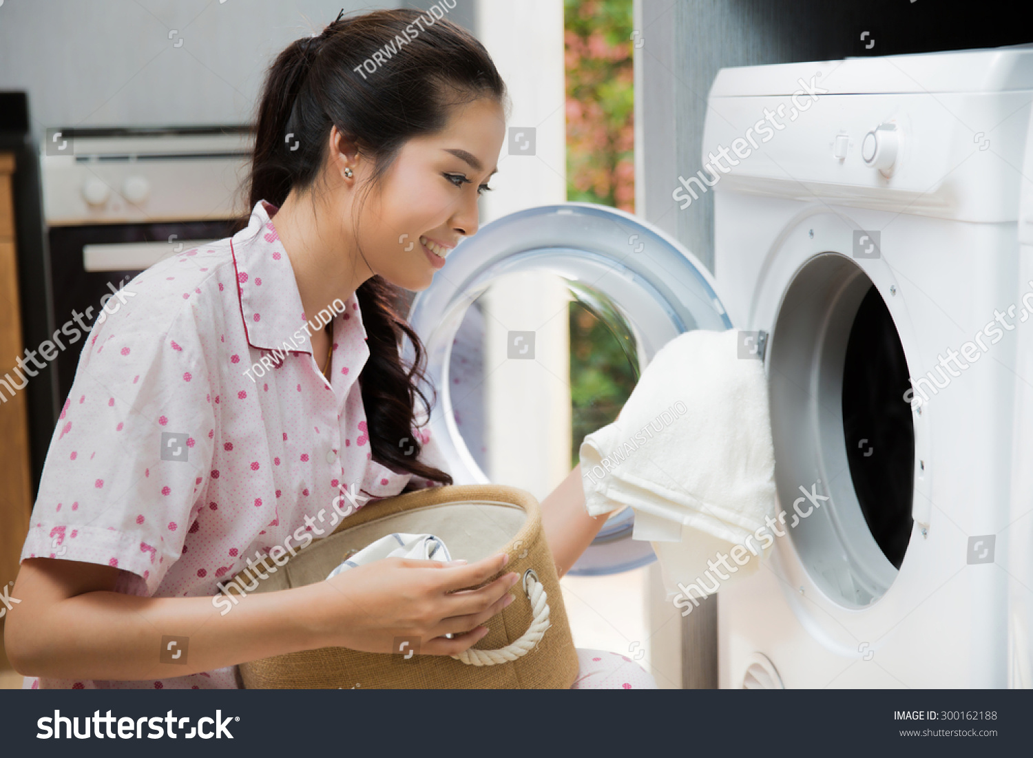 Women washing clothes The washing machine