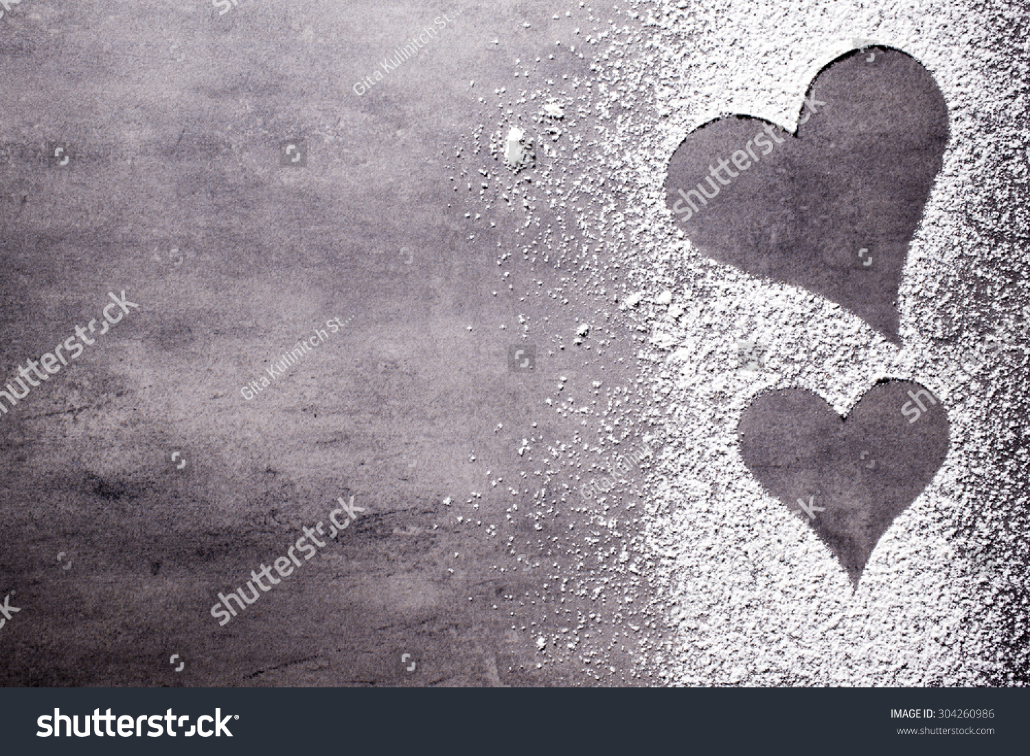 On the gray surface of the heart shape.