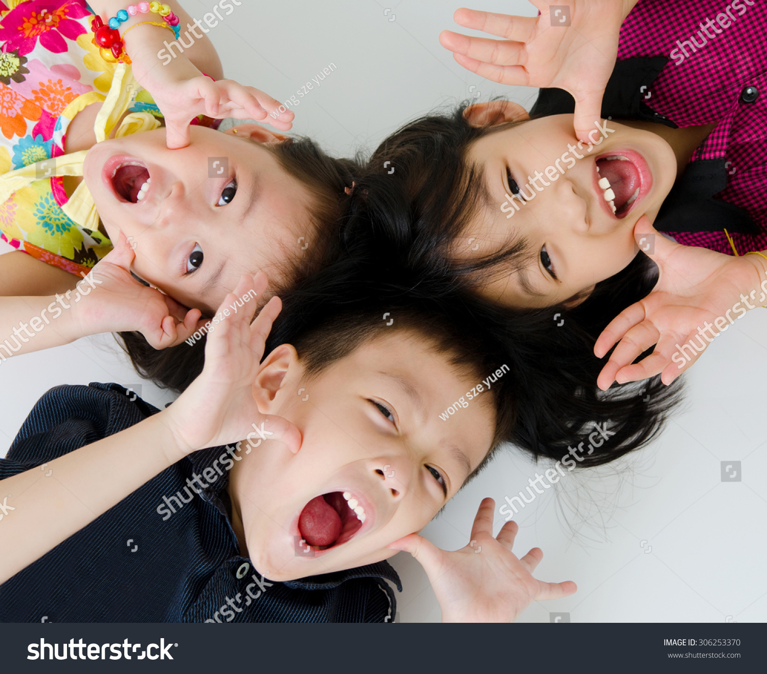 Asian kids in funny expression