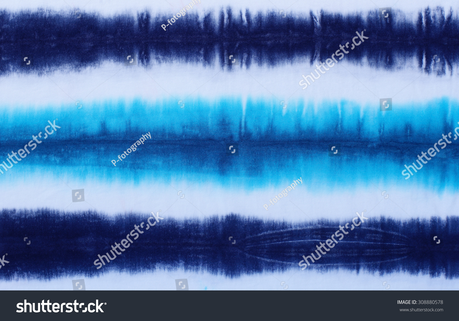 striped tie dyed pattern on cotton fabric abstract background.
