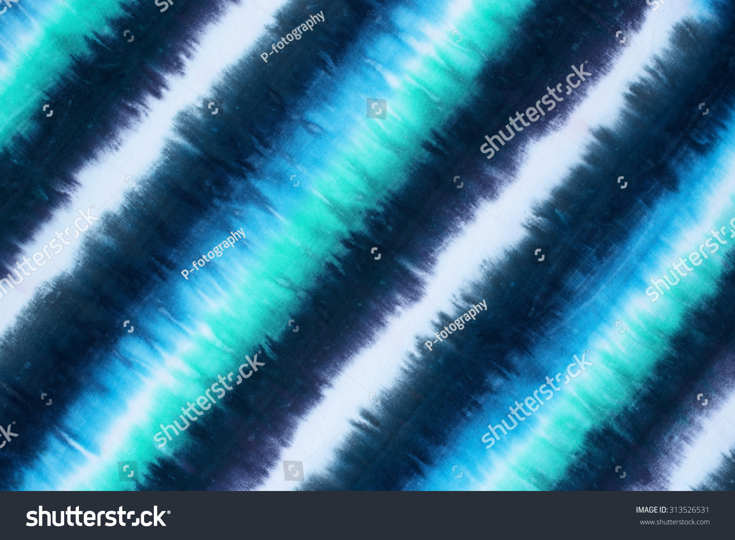 striped tie dyed pattern on cotton fabric abstract background. 
