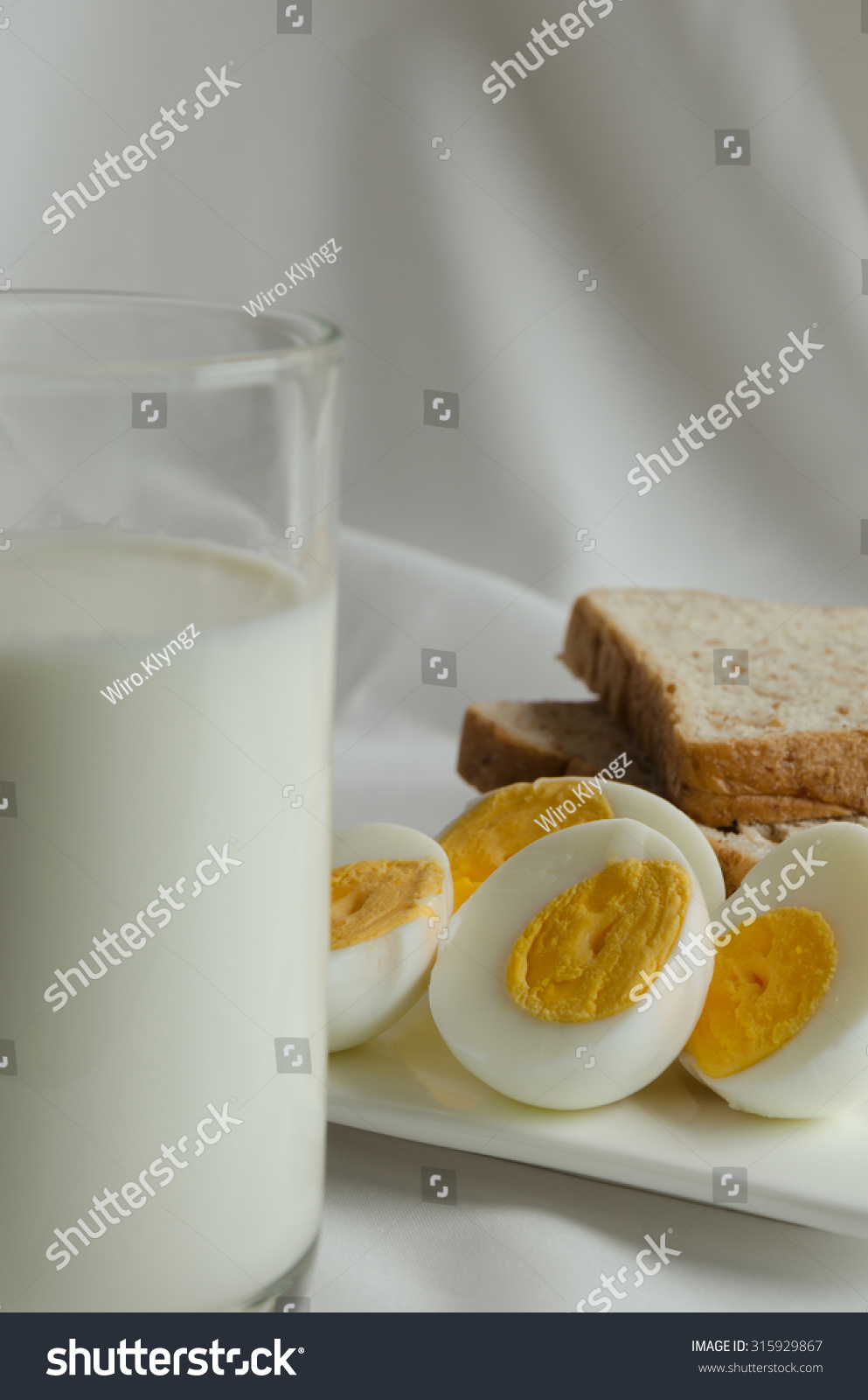 Whole Wheat Bread  Boiled Egg and Milk for Breakfast.