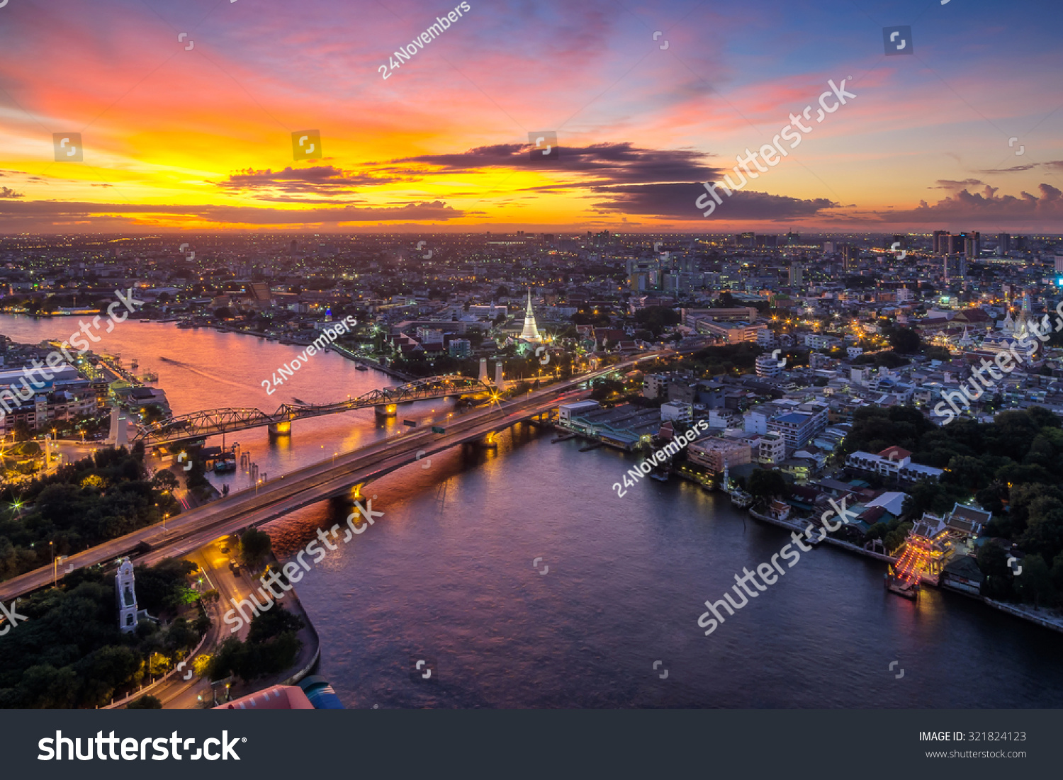 Landscaped areas Buddha Yodfa Bridge is a bridge of communication between the capital of Thonburi in Bangkok at twilight dramatic sky.