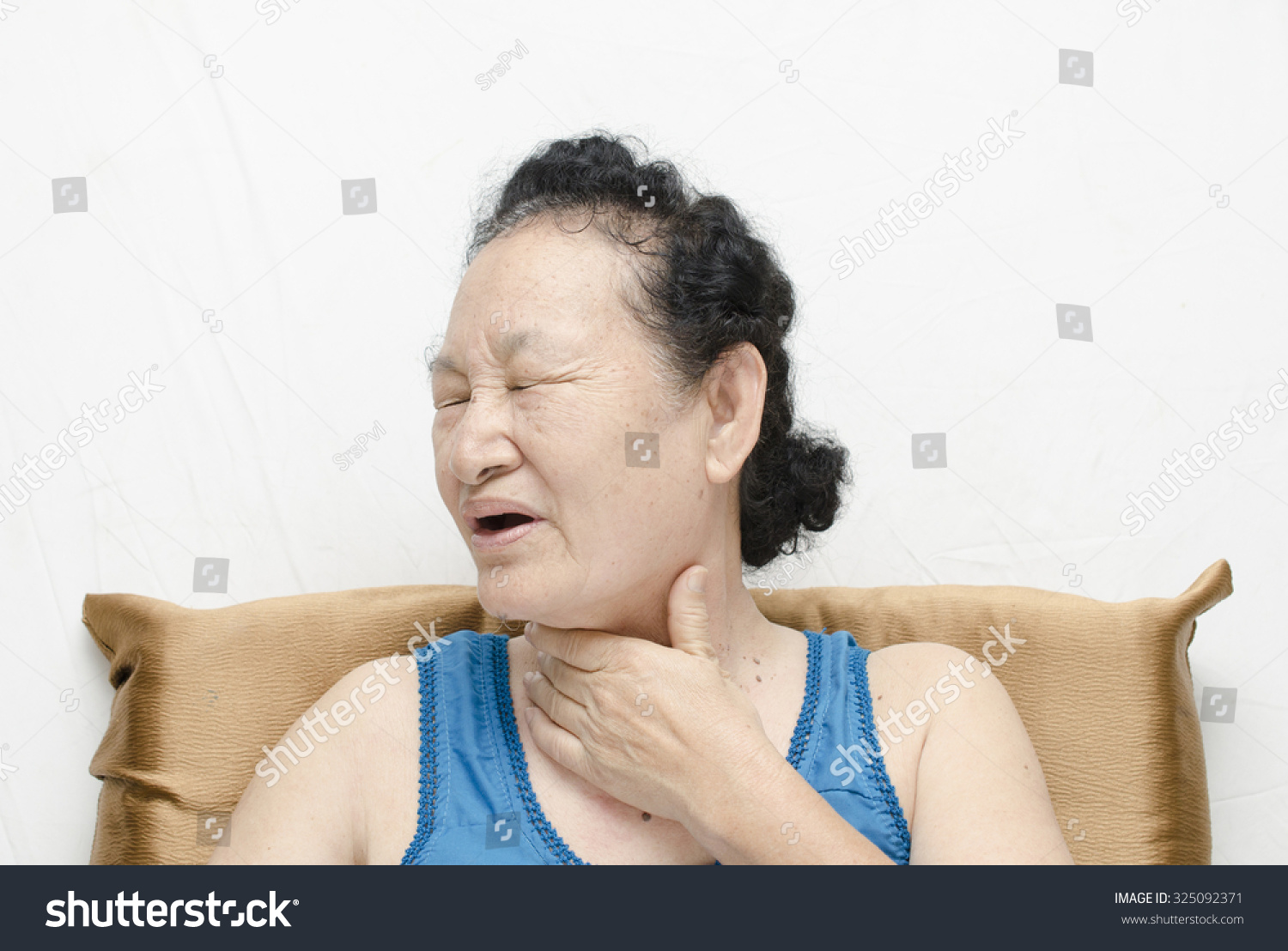 Portrait of asian senior woman sore throat expression