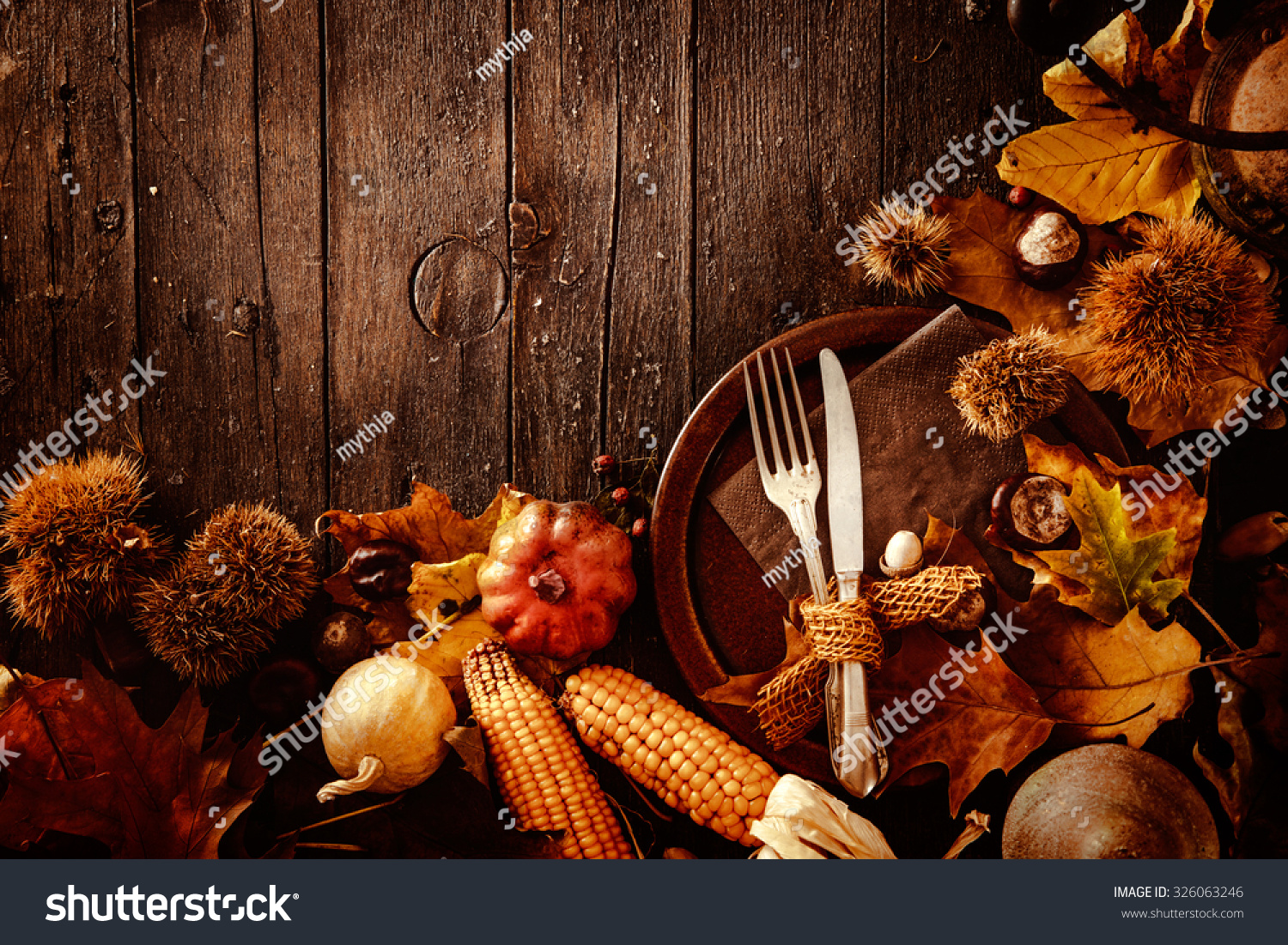 Thanksgiving dinner. Autumn fruit with plate and cutlery. Thanksgiving autumn background