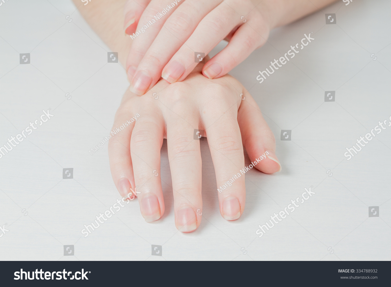 close up of female hands. soft light.