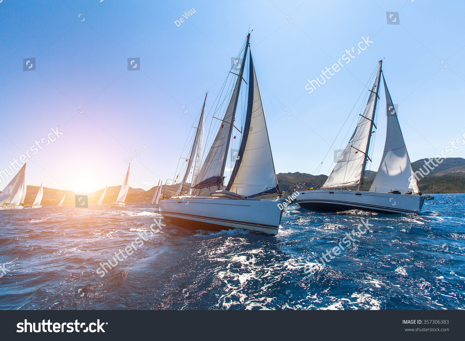 Luxury yachts at Sailing regatta. Sailing in the wind through the waves at the Sea. 