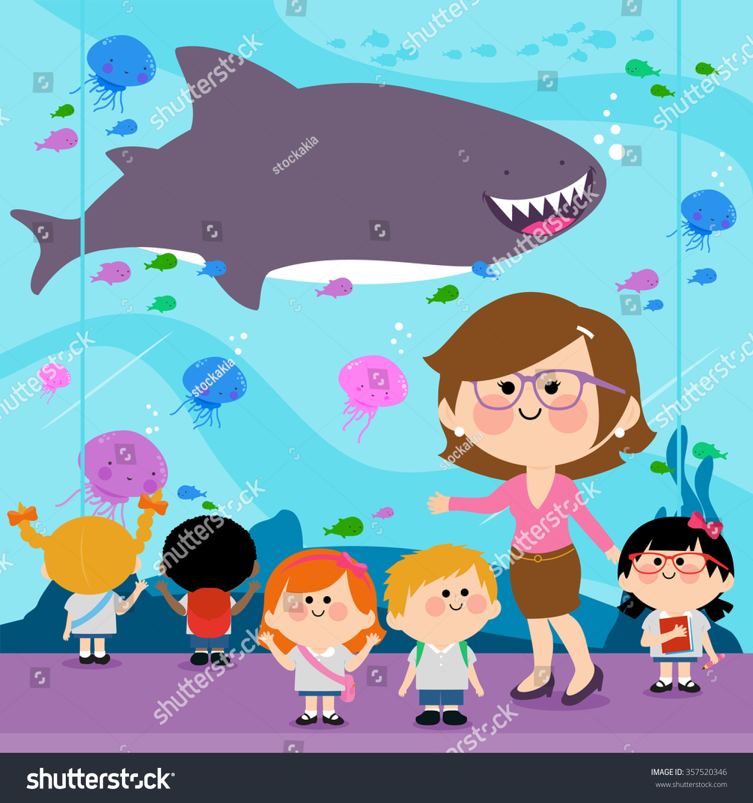 Students and their teacher visiting the aquarium. 