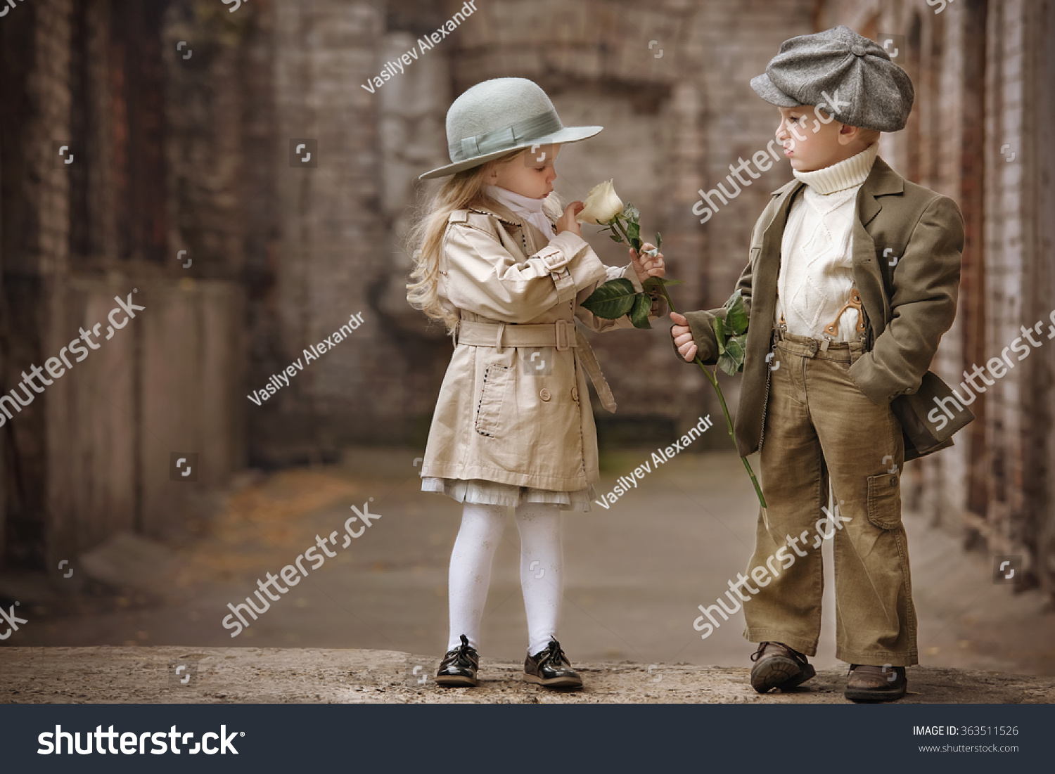 Friendly romantic encounter boys and girls autumn day in the old town