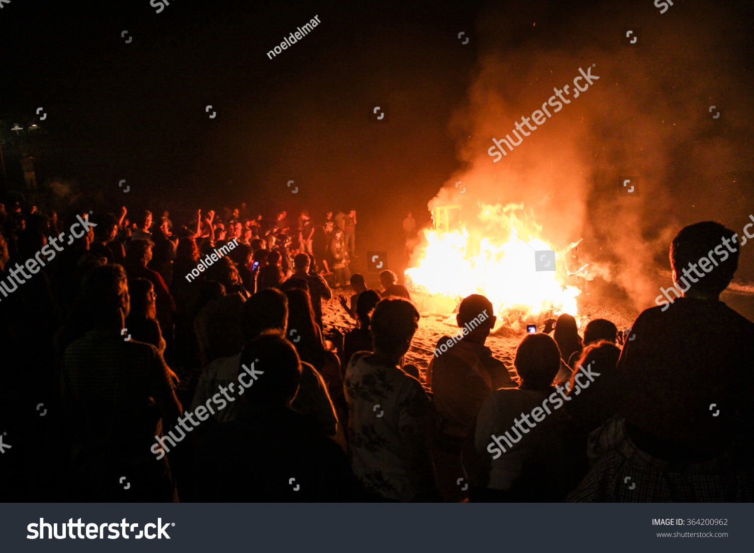 People watching the bonfire
