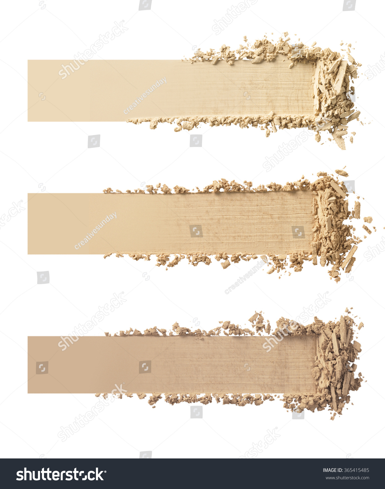 Three shades of makeup powder on white background.