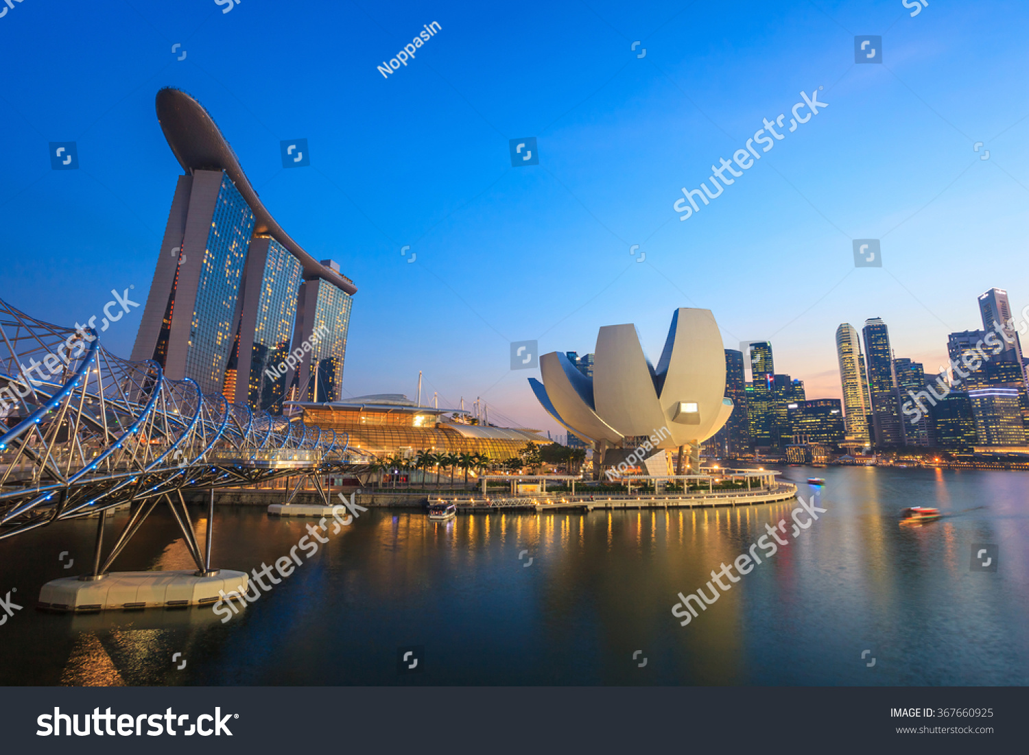 Singapore city skyline at Marina Bay cityscape by night