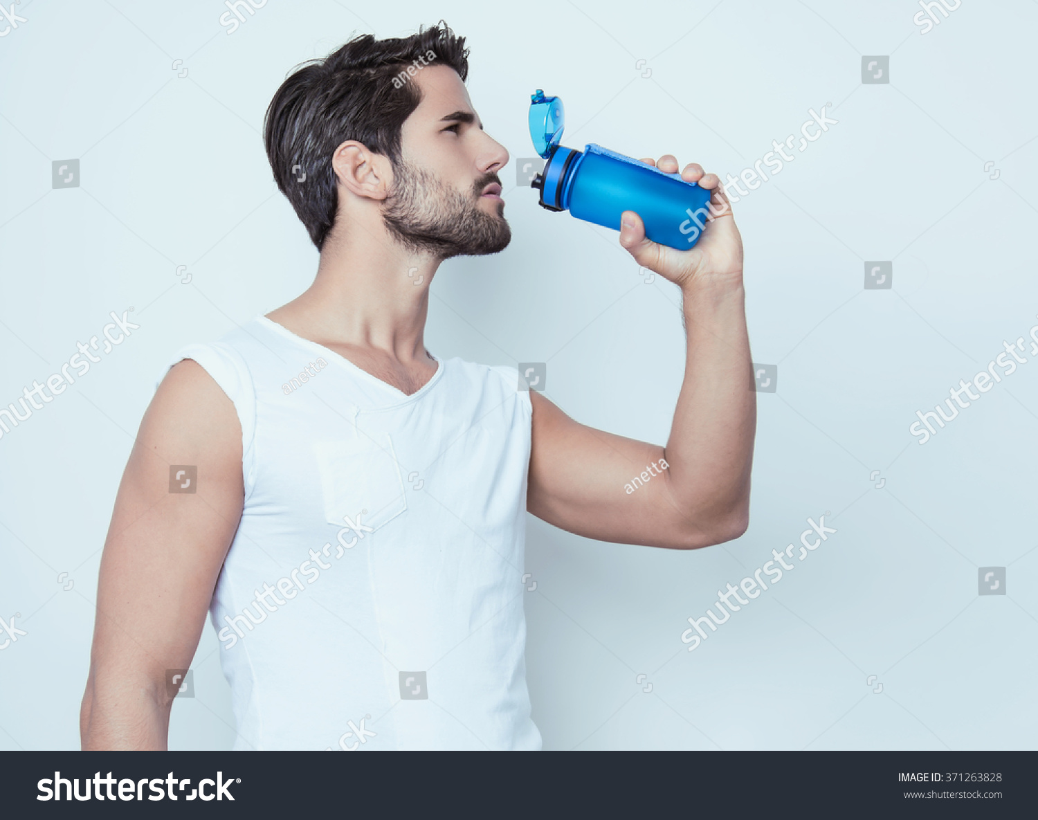 handsome young and fit man in workout clothes