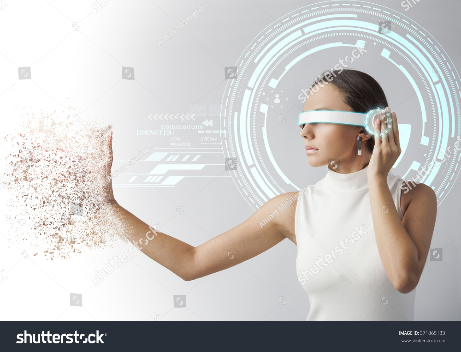 Young woman looking at virtual graphics in futuristic background