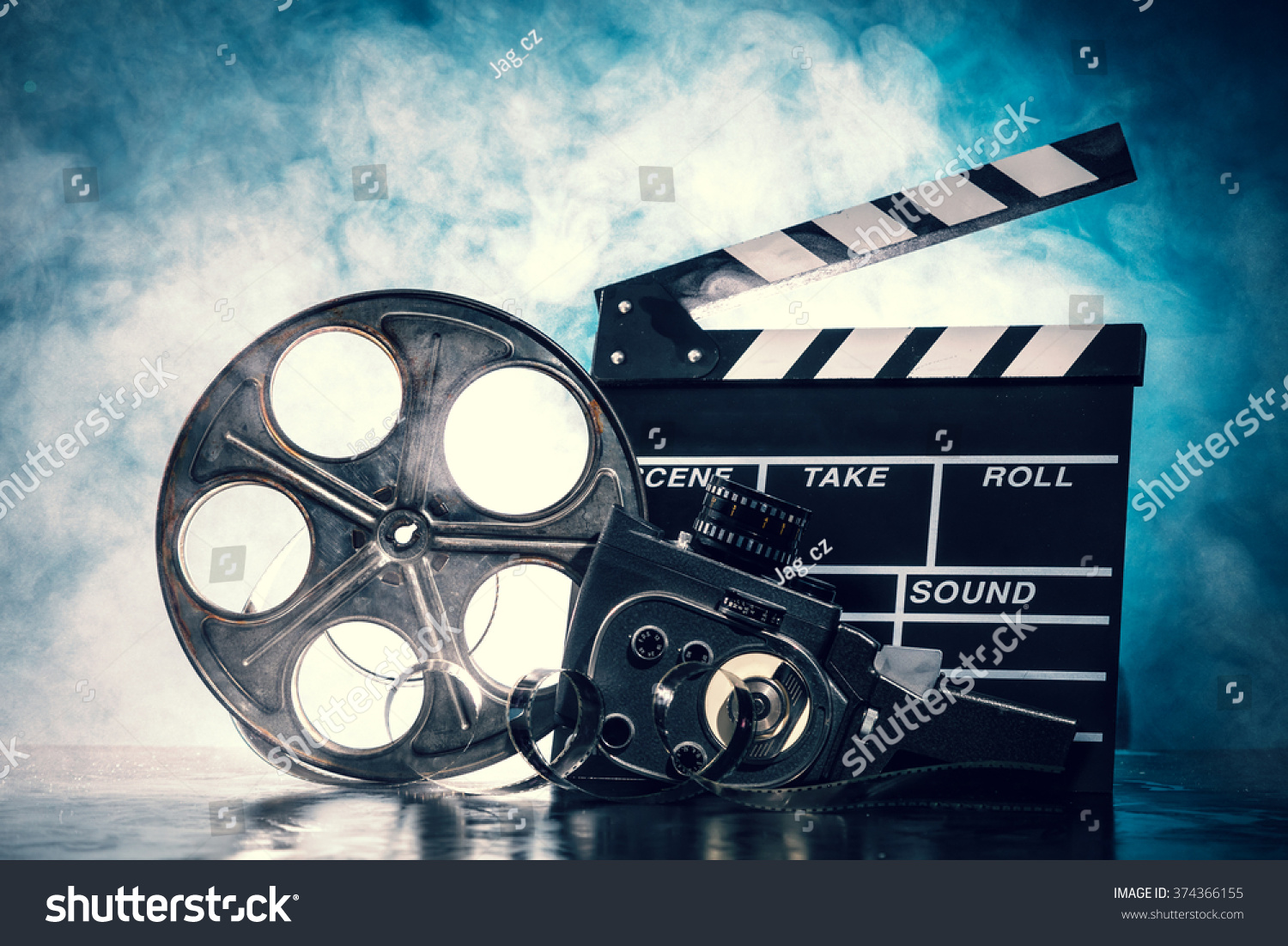 Retro film production accessories still life. Concept of film-making. Smoke effect on background