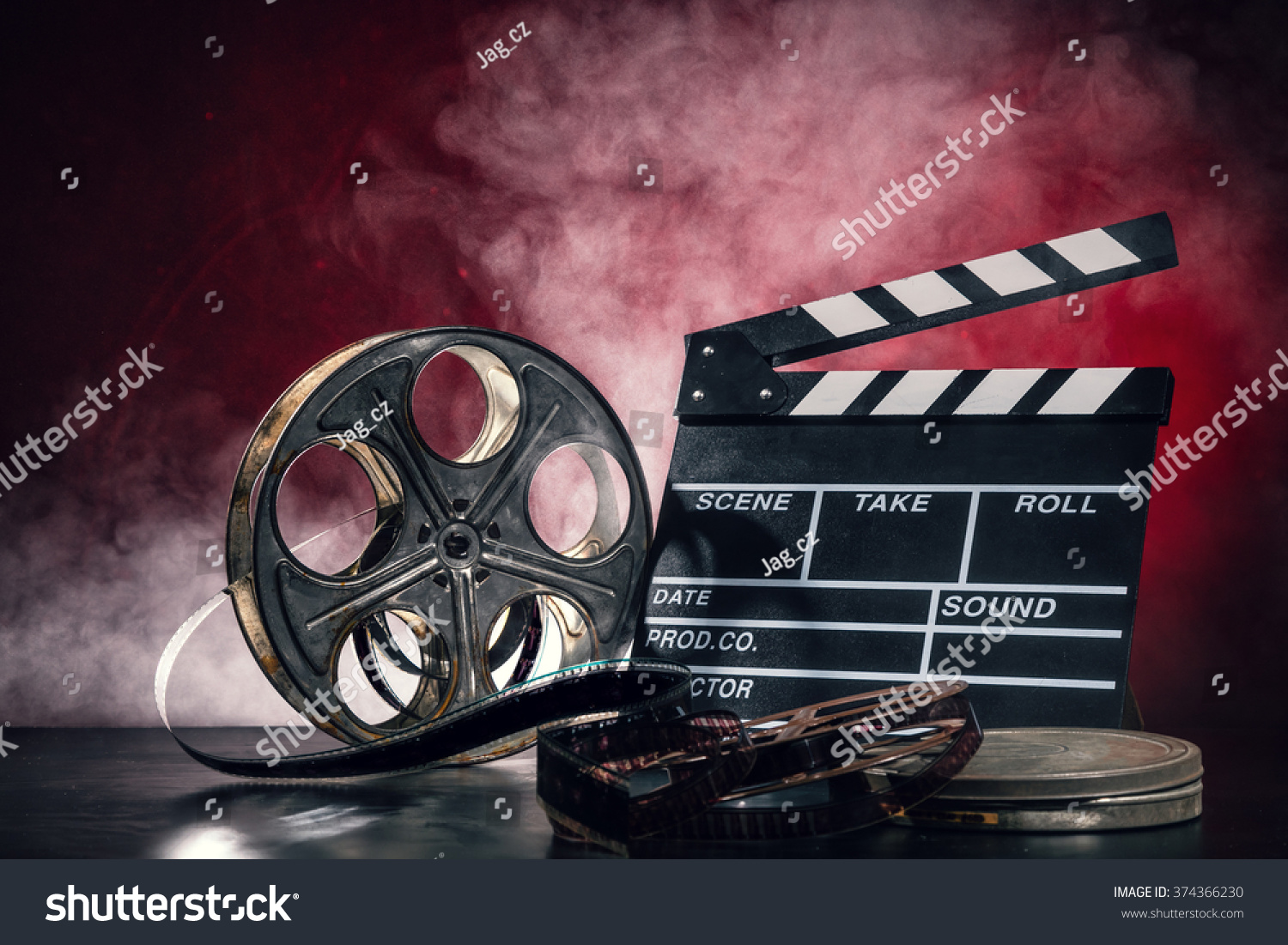 Retro film production accessories still life. Concept of film-making. Smoke effect on background