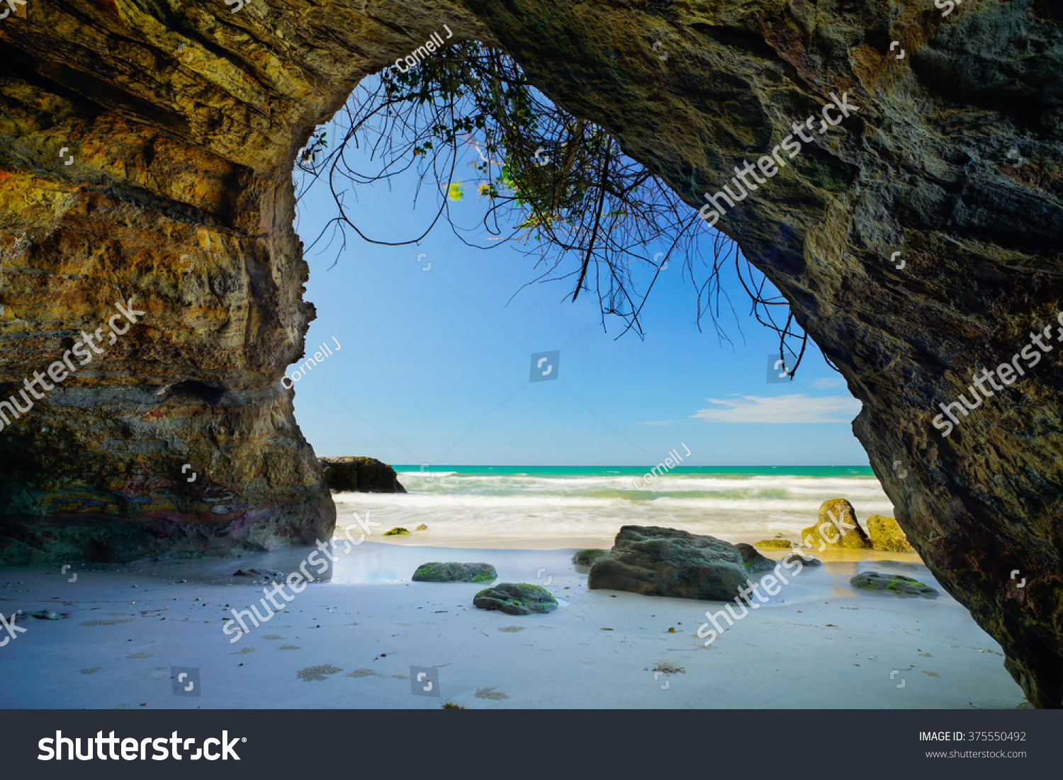 Beach view from inside the cave.