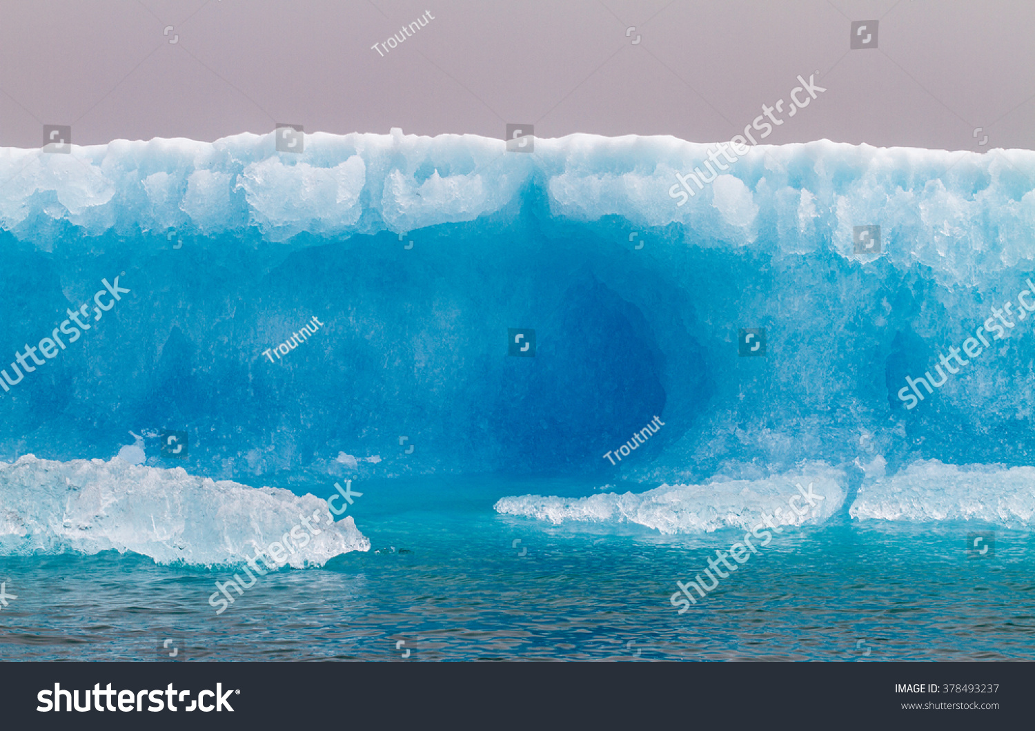 Chunks of ice that calved off a tidewater glacier float around in the frigid waters of Prince William Sound  Alaska