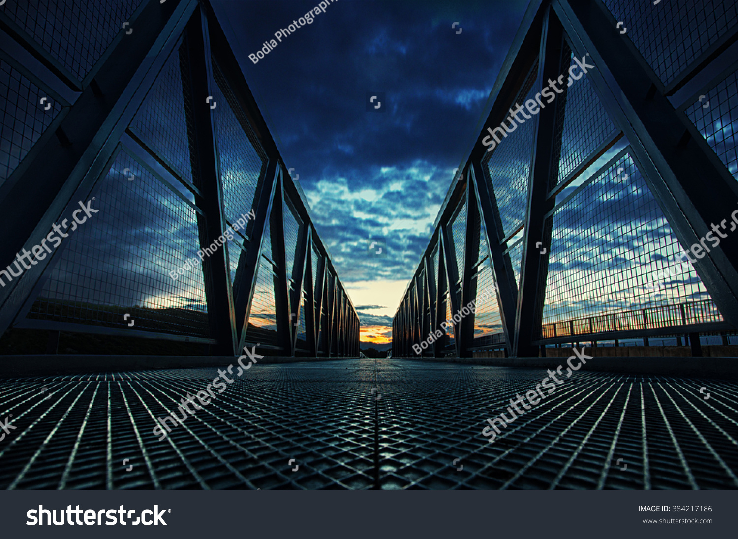 Symmetrical bridge at sunset