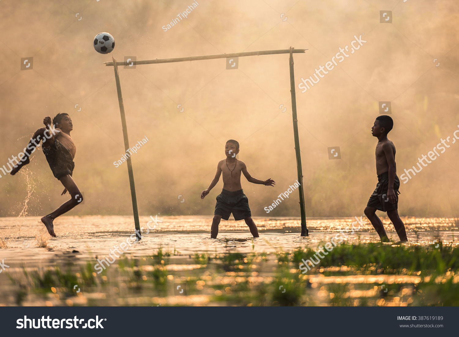 Boy kicking a soccer ball 