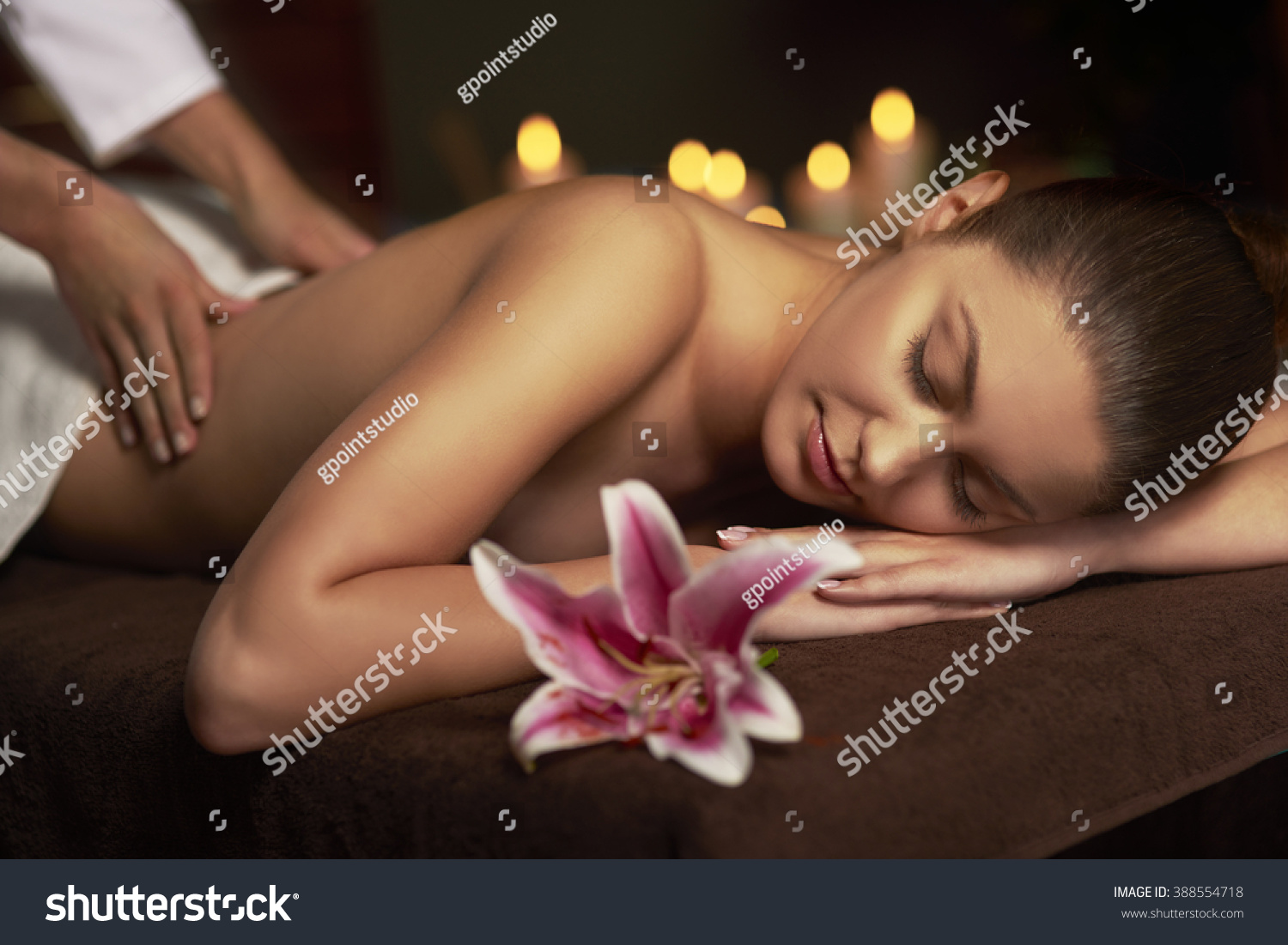 Woman paying visit at massage therapist