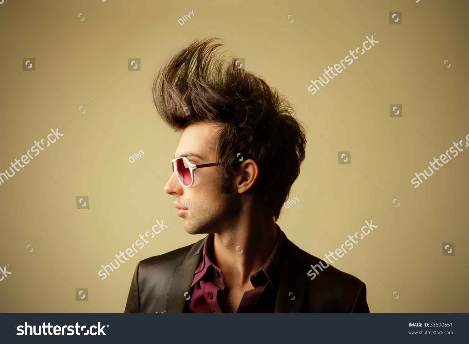 profile of guy with big tuft