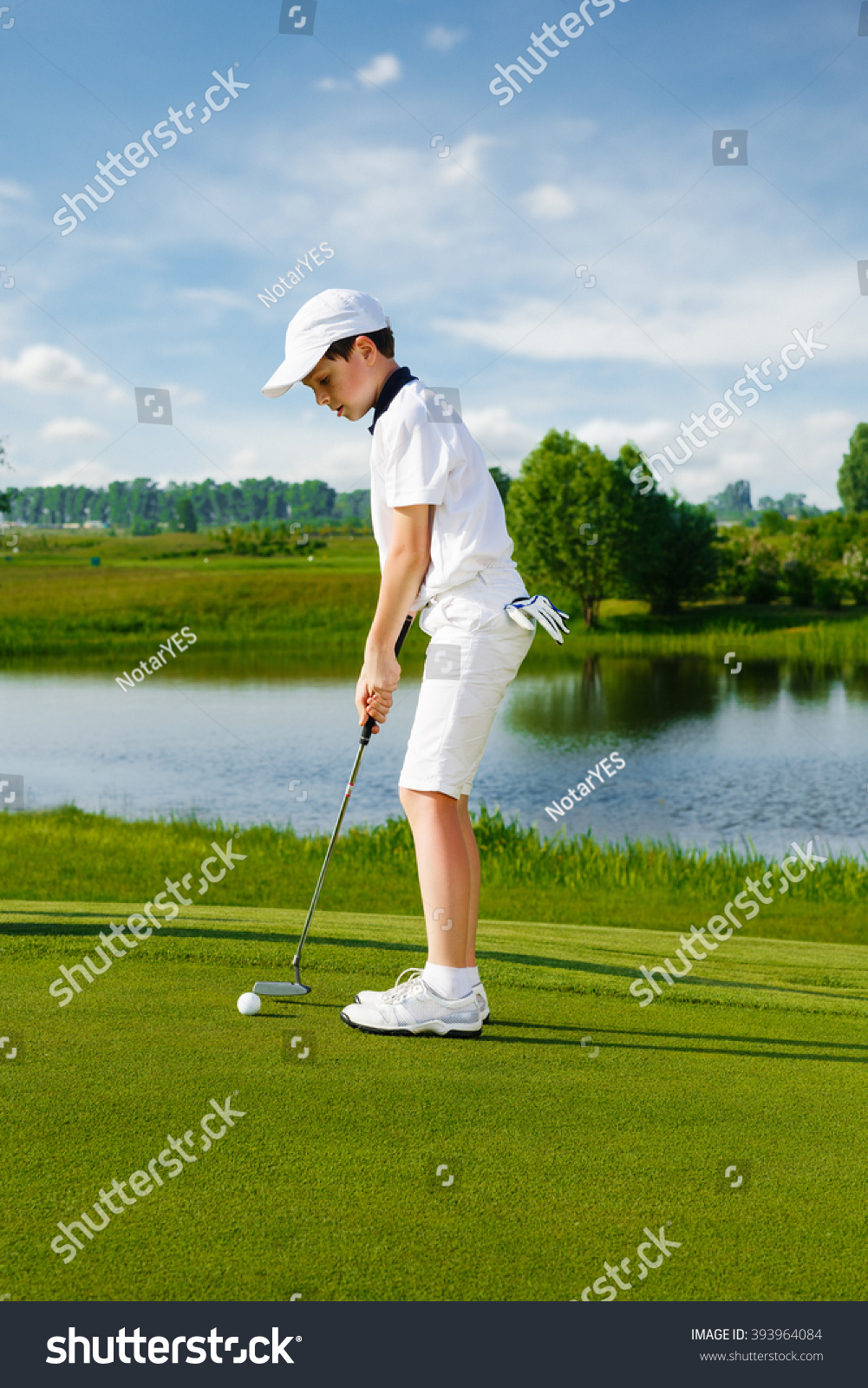 Portrait of boy golfer 