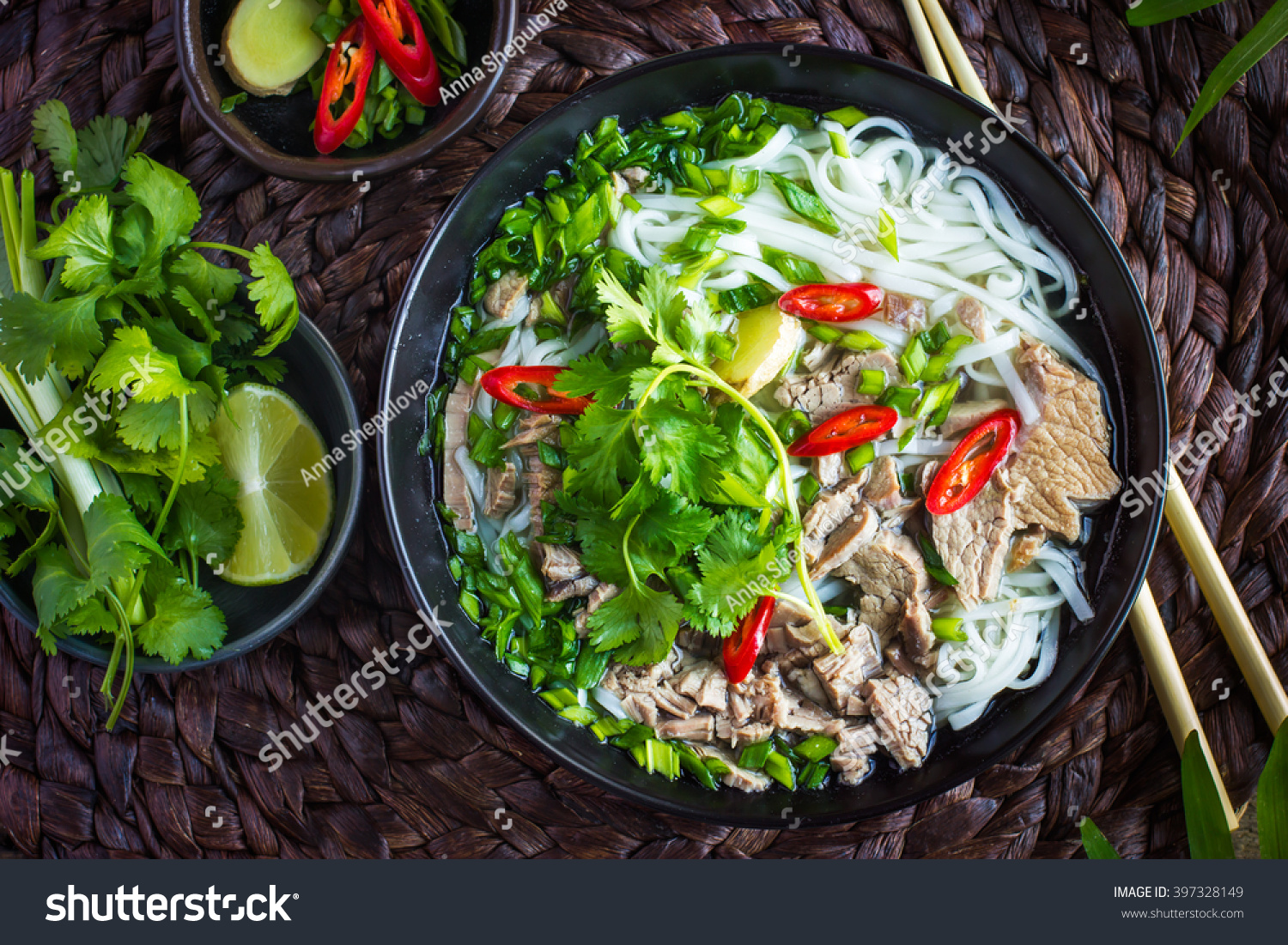 Traditional Vietnamese  soup Pho with beef and rice noodles  top view