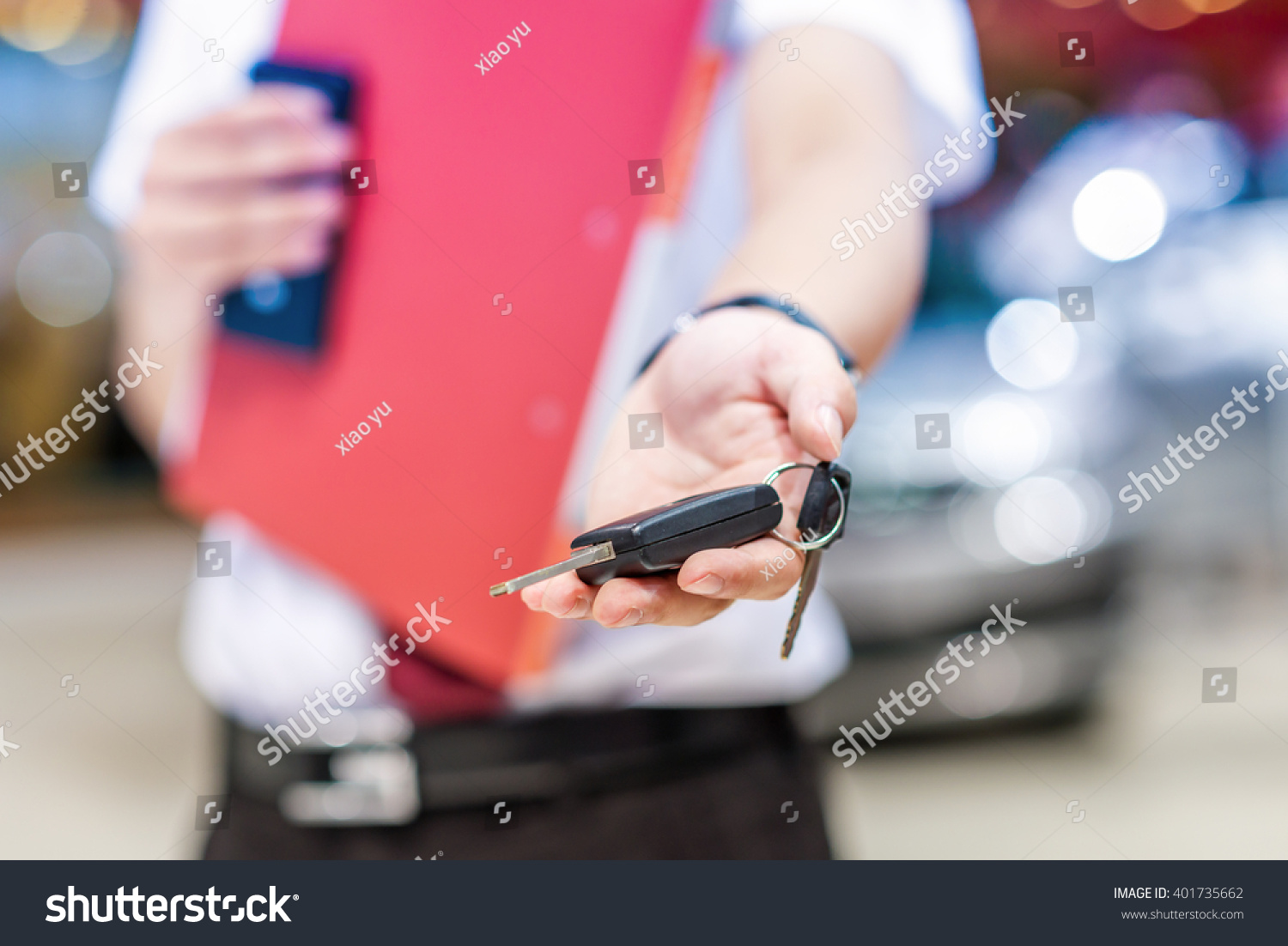 Hand with a Car keys. Transportation. Driving.