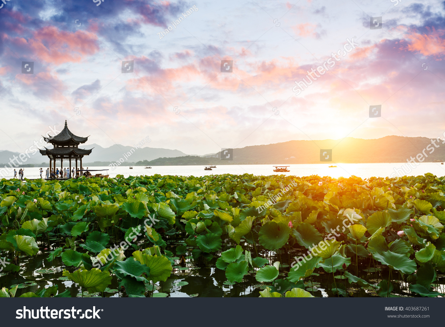 ancient pavilion of Hangzhou west lake at dusk  in China
