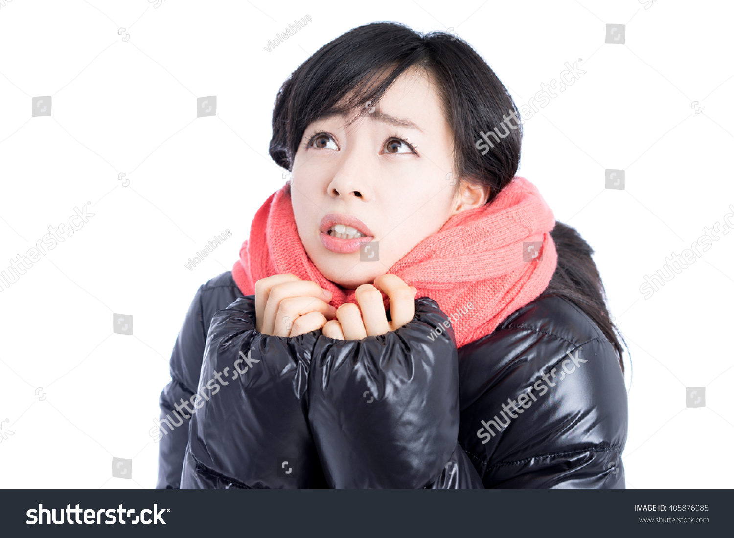 Beautiful young woman wearing down jacket  isolated on white background