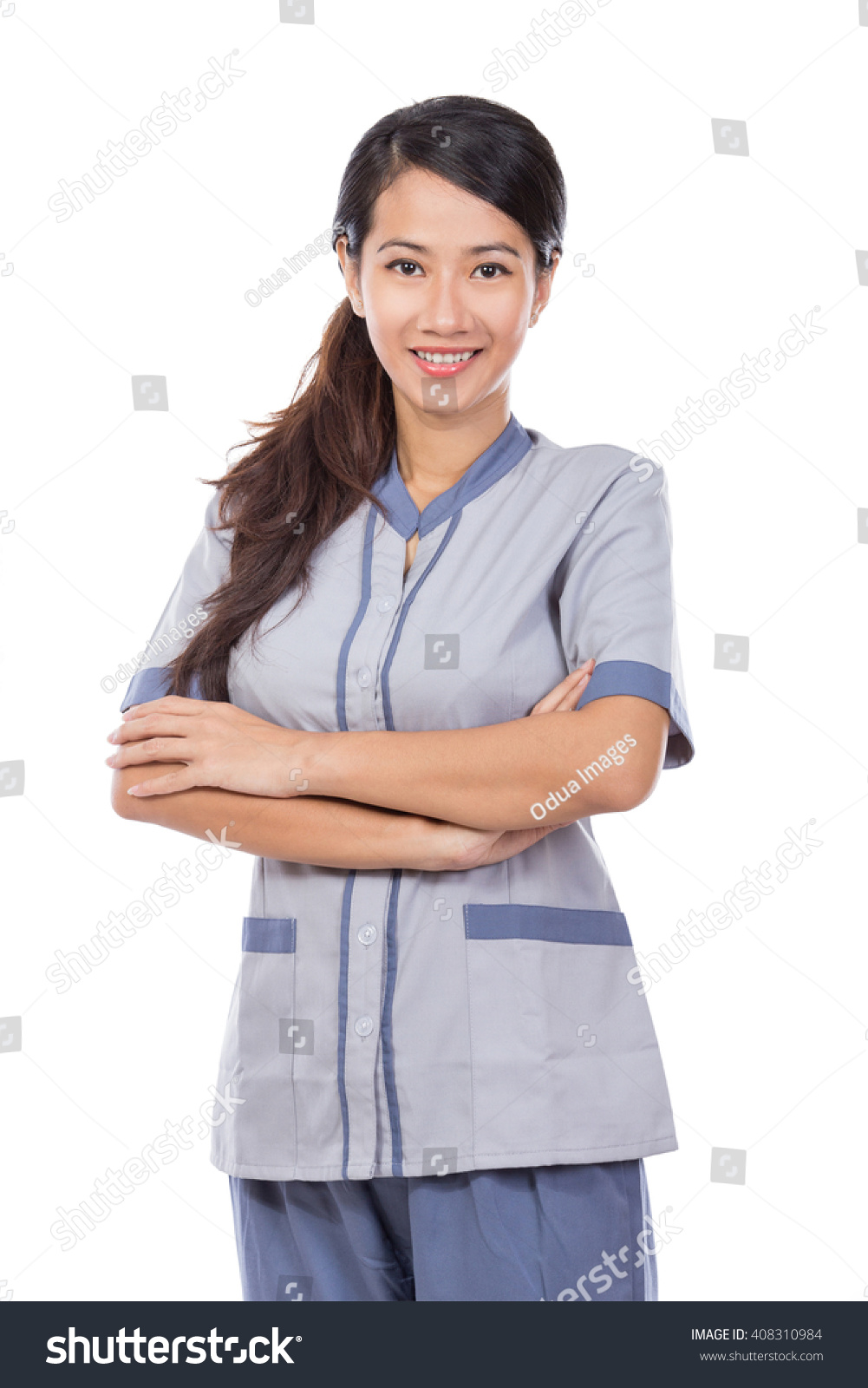 portrait of curious female Asian maid in uniform thinking. isolated over white background