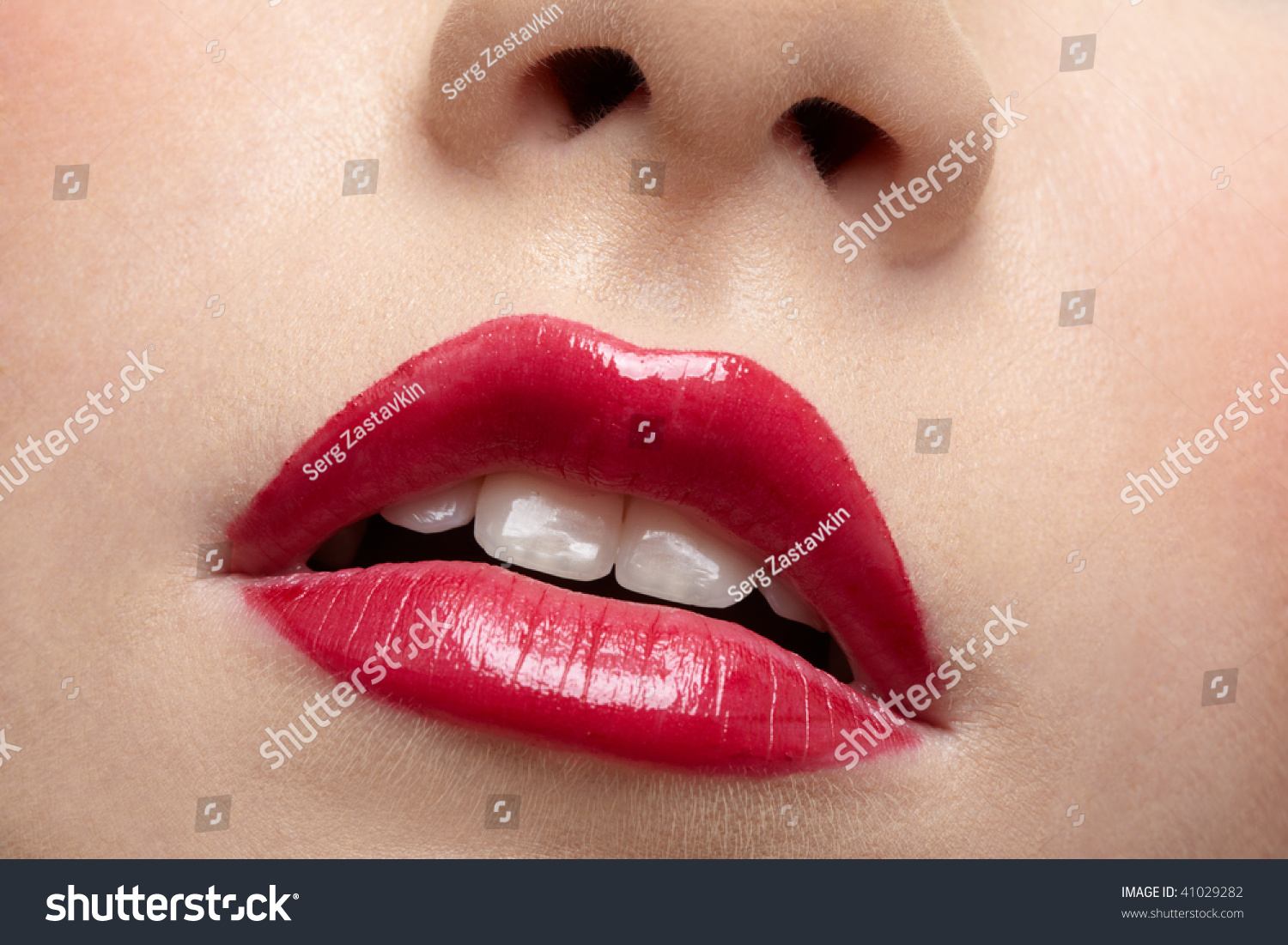 close-up of beautiful girls lips zone make up