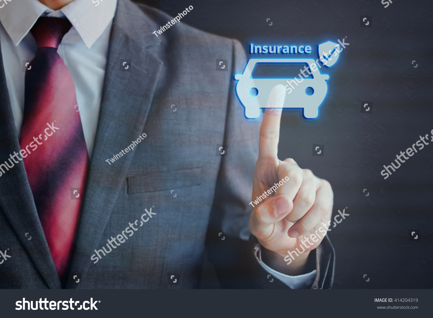 Businessman pressing insured car icon in the air with one finger - car insurance concept