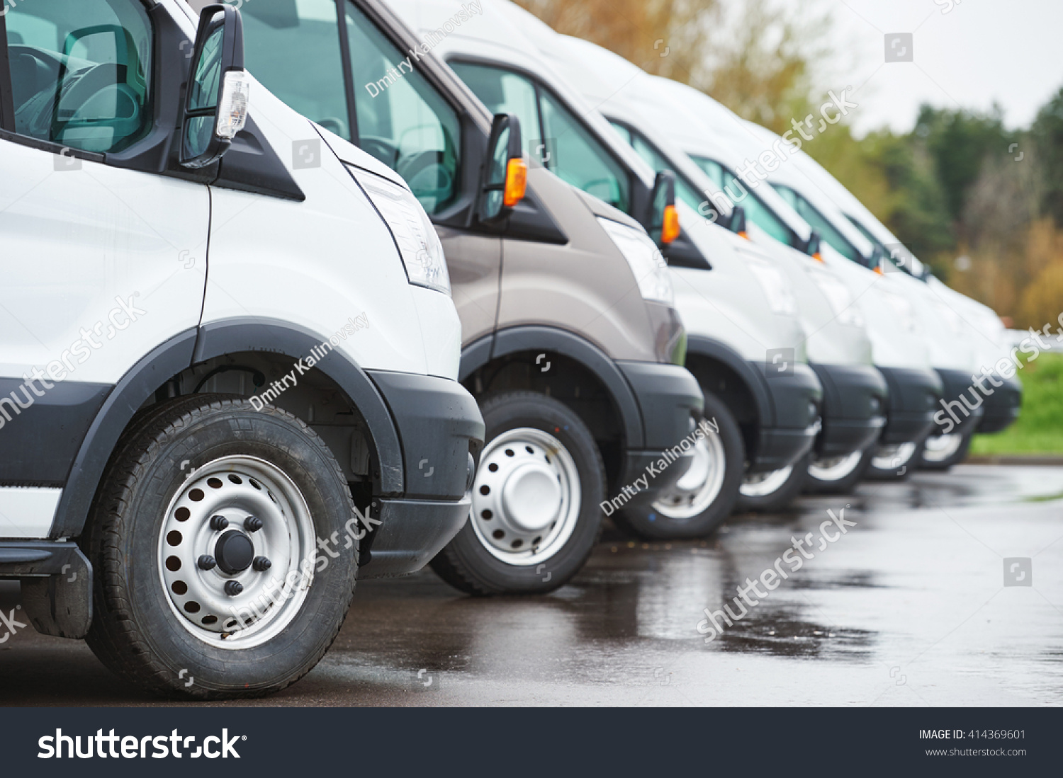 transporting service company. commercial delivery vans in row 