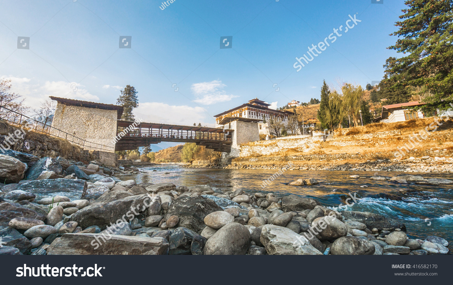 The bridge across the river with traditional bhutan palace  Paro Rinpung Dzong  Bhutan