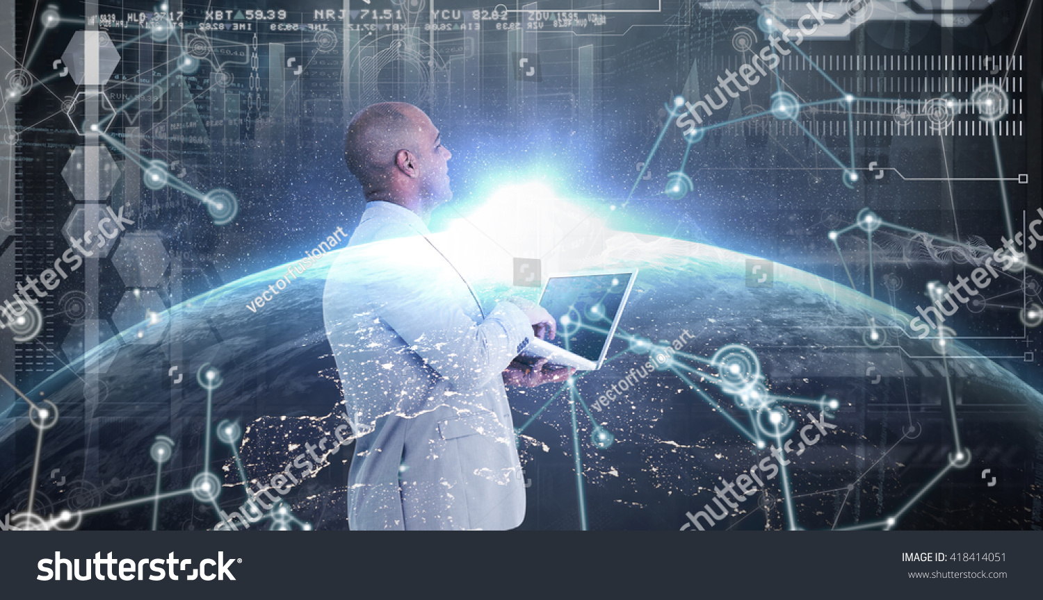 Businessman using laptop against image of a earth