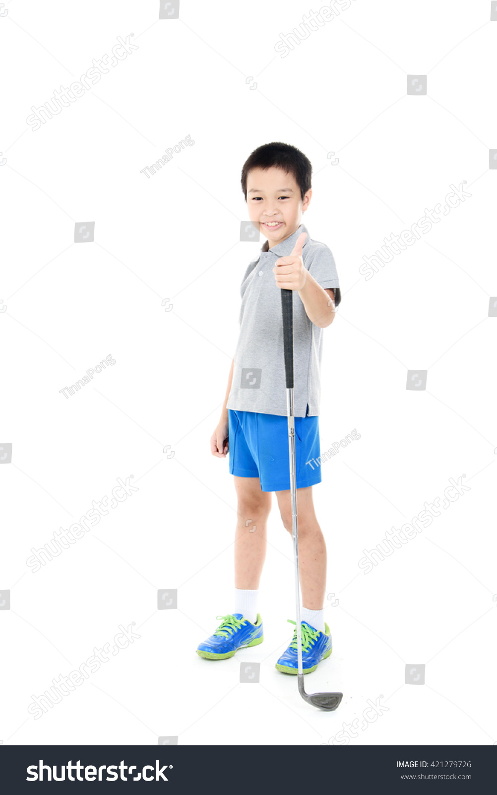 Young asian boy play golf on white background.