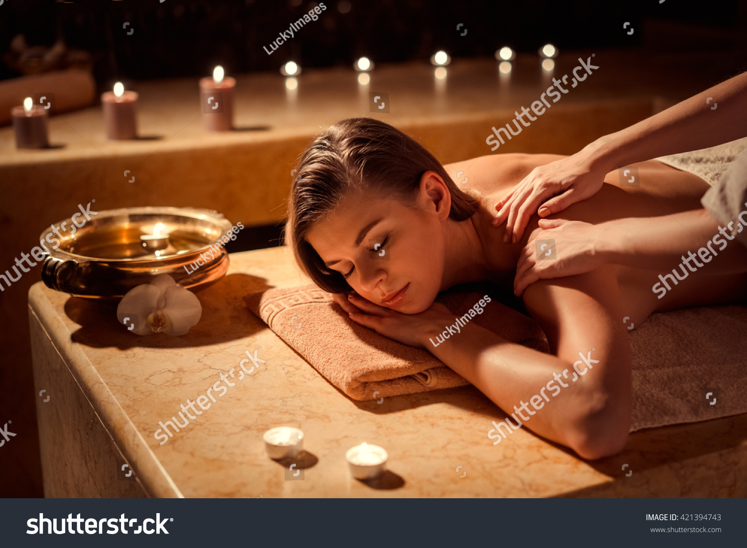 Young girl in spa massage