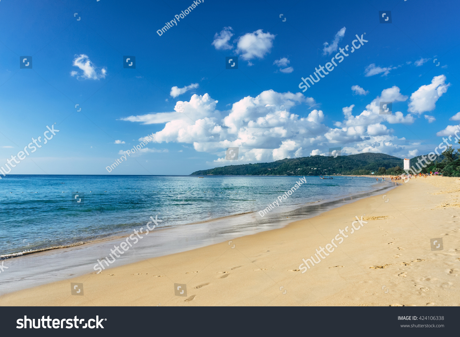 Beautiful sea view on Karon beach Phuket Thailand Asia. Famous Karon beach landscape Phuket. Sunny beach. Beautiful white sand sea shore and calm sea in Phuket Thailand. Endless sandy coastline.