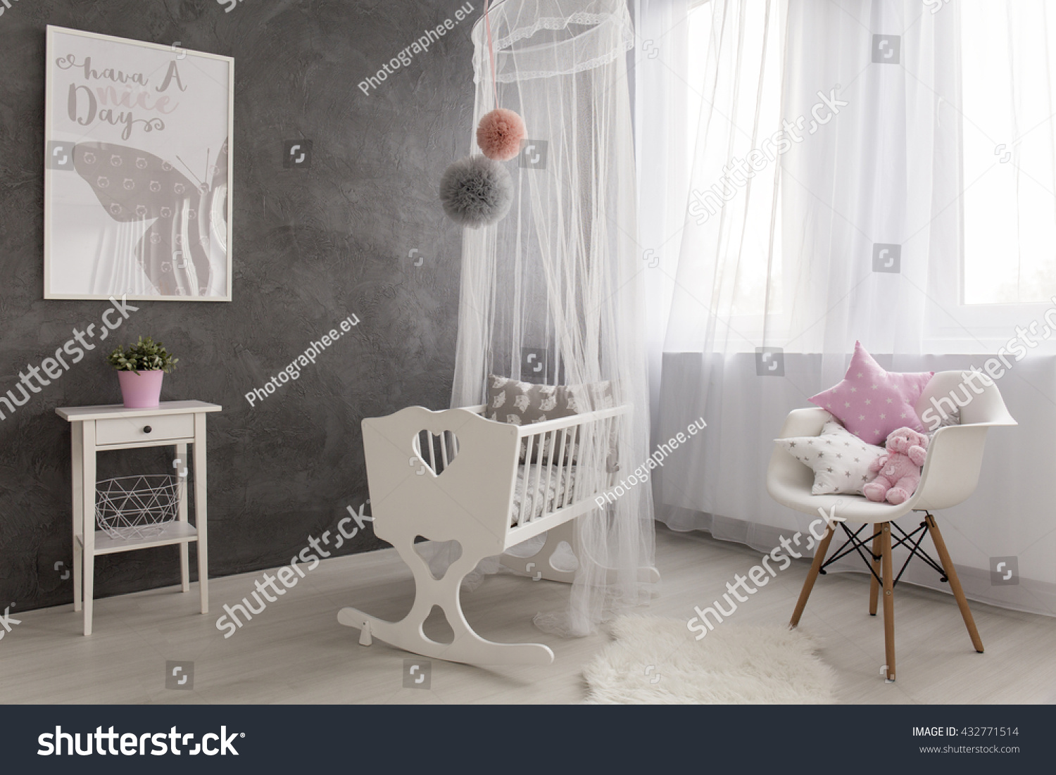 Shot of a cozy baby girl room with a big window