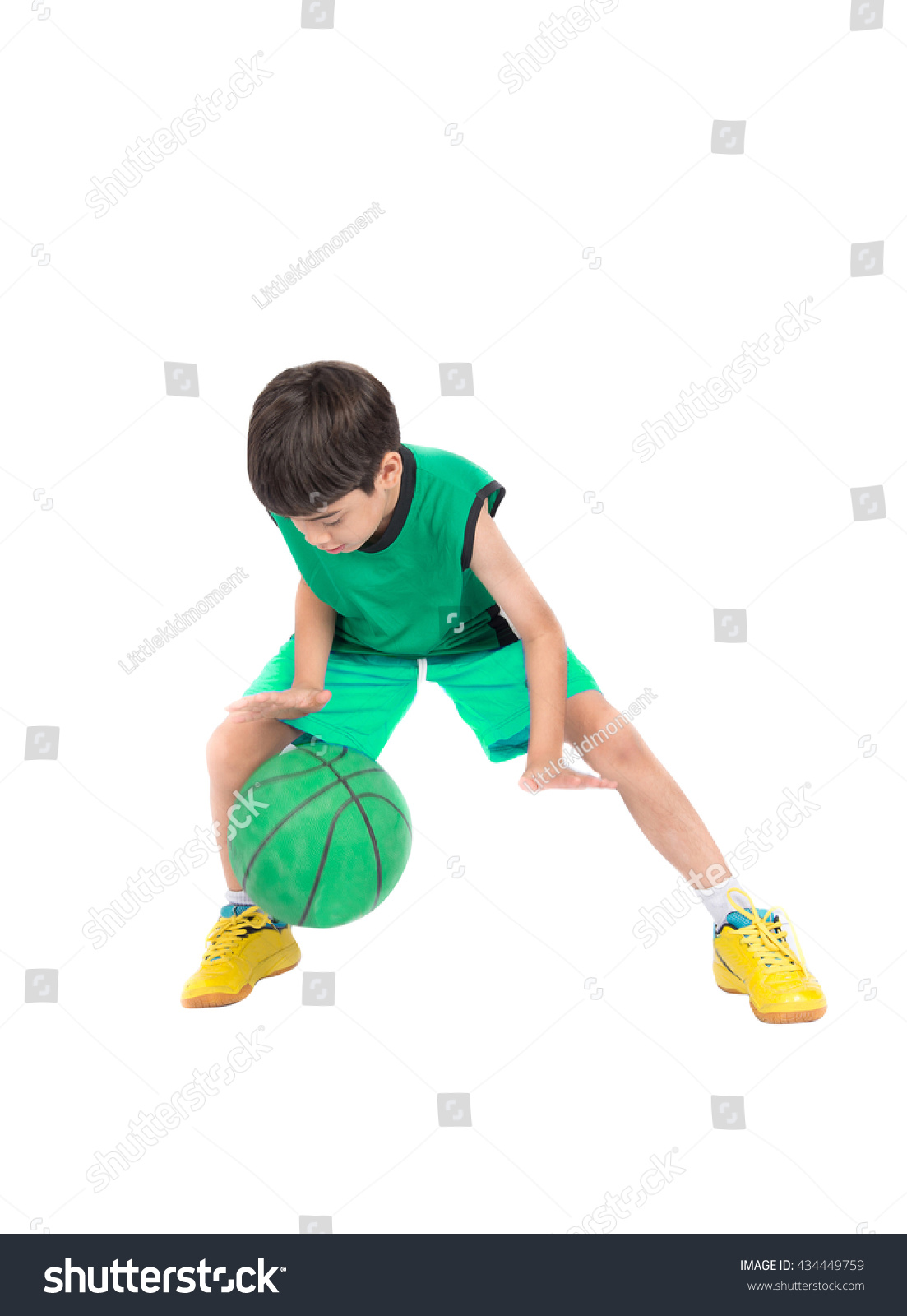 Little boy playing green basketball in green PE uniform sport  with clipping path isolate on white background