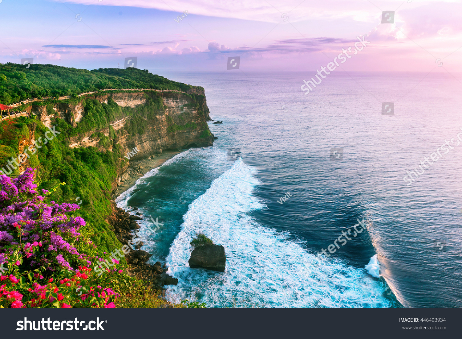 View of Uluwatu cliff with pavilion and blue sea in Bali  Indonesia