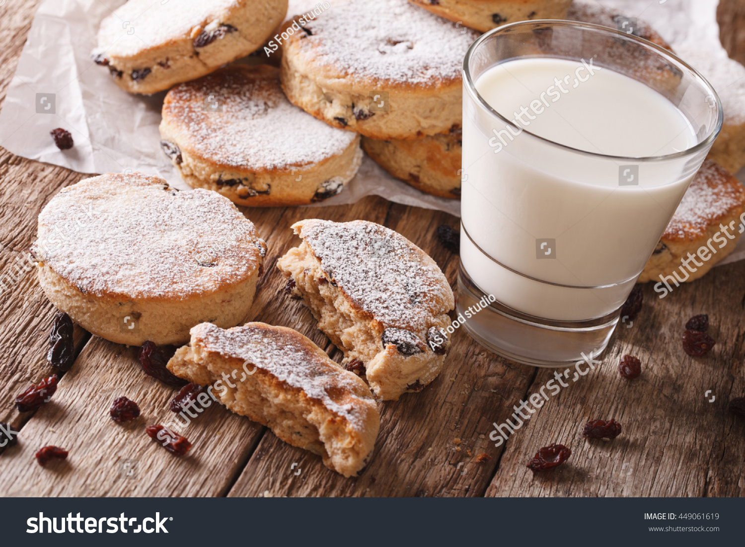 Homemade Welsh cakes with raisins and milk close-up on the table. Horizontal