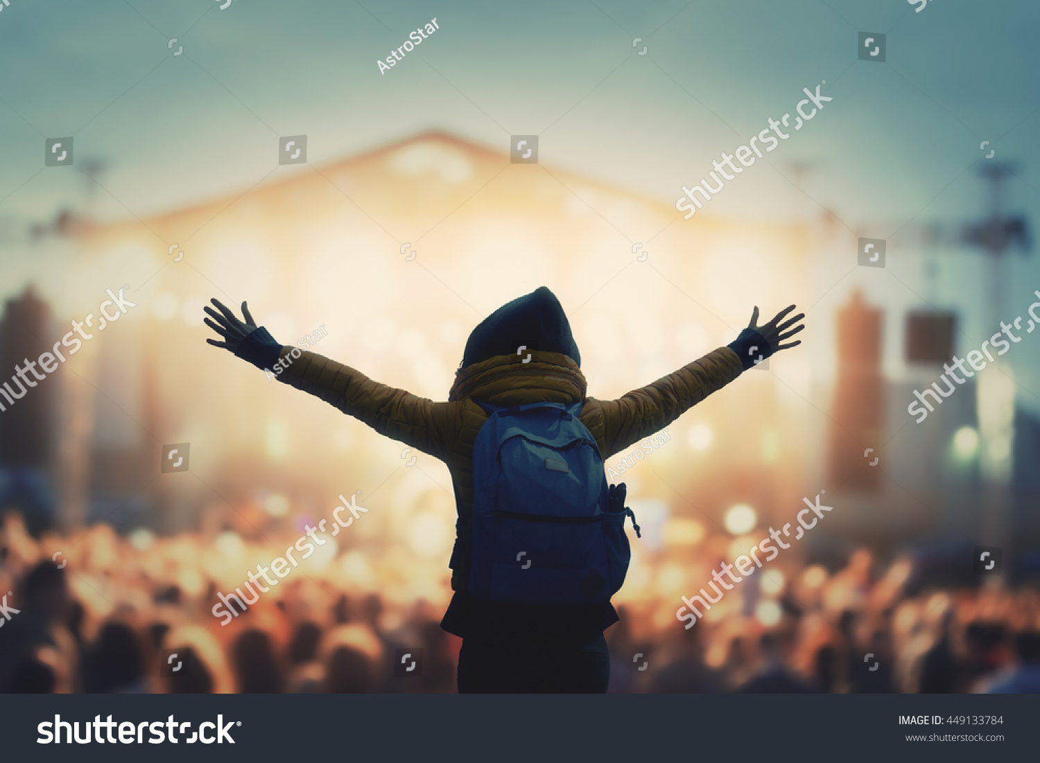 Girl enjoying the music festival / concert.