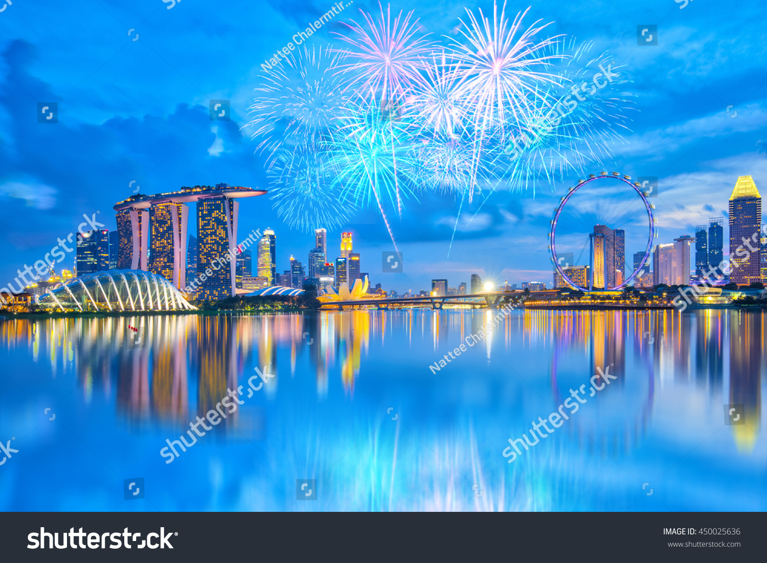 Singapore Fireworks with view of the Singapore Marina bay at night.